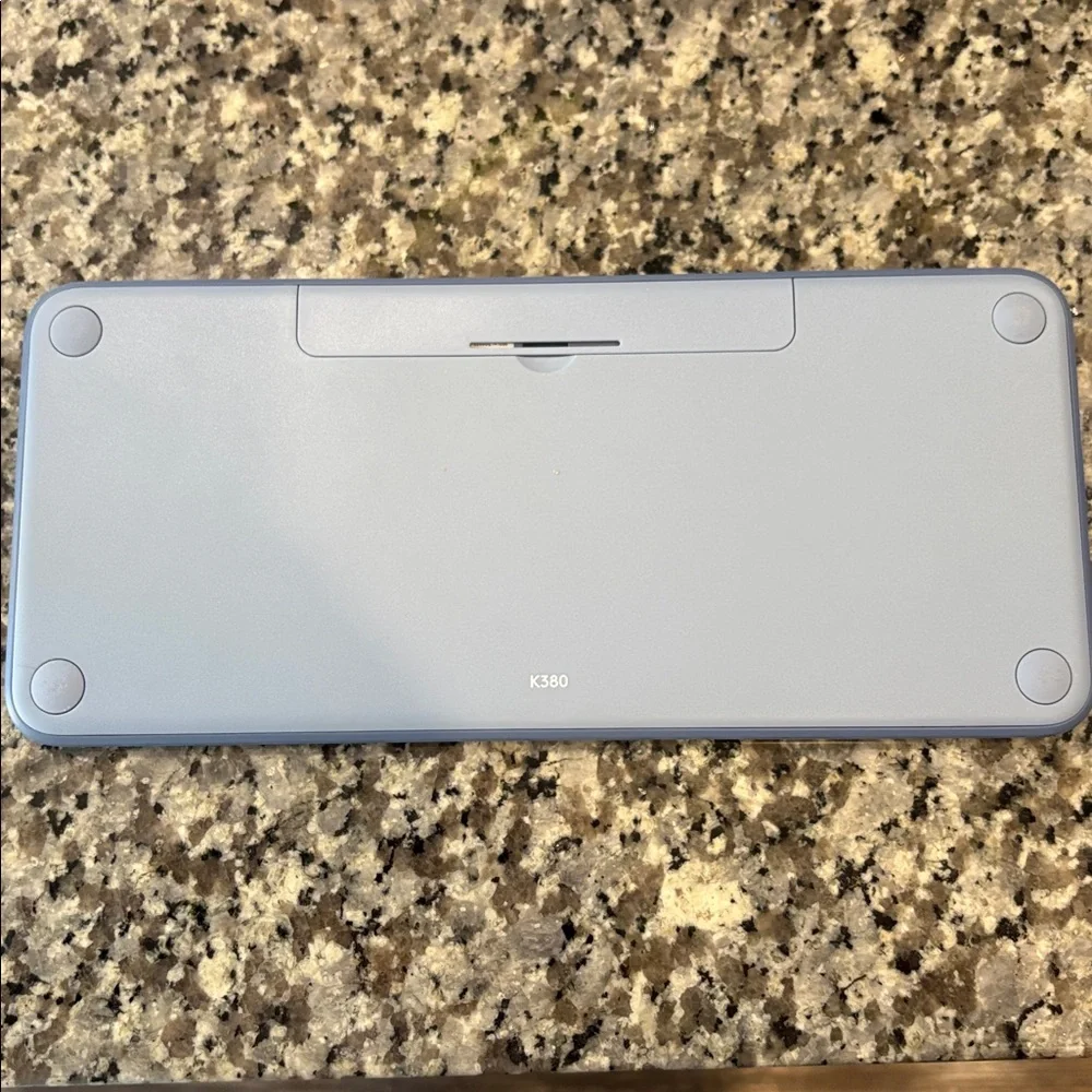 Blue Logitech Compact Wireless Keyboard